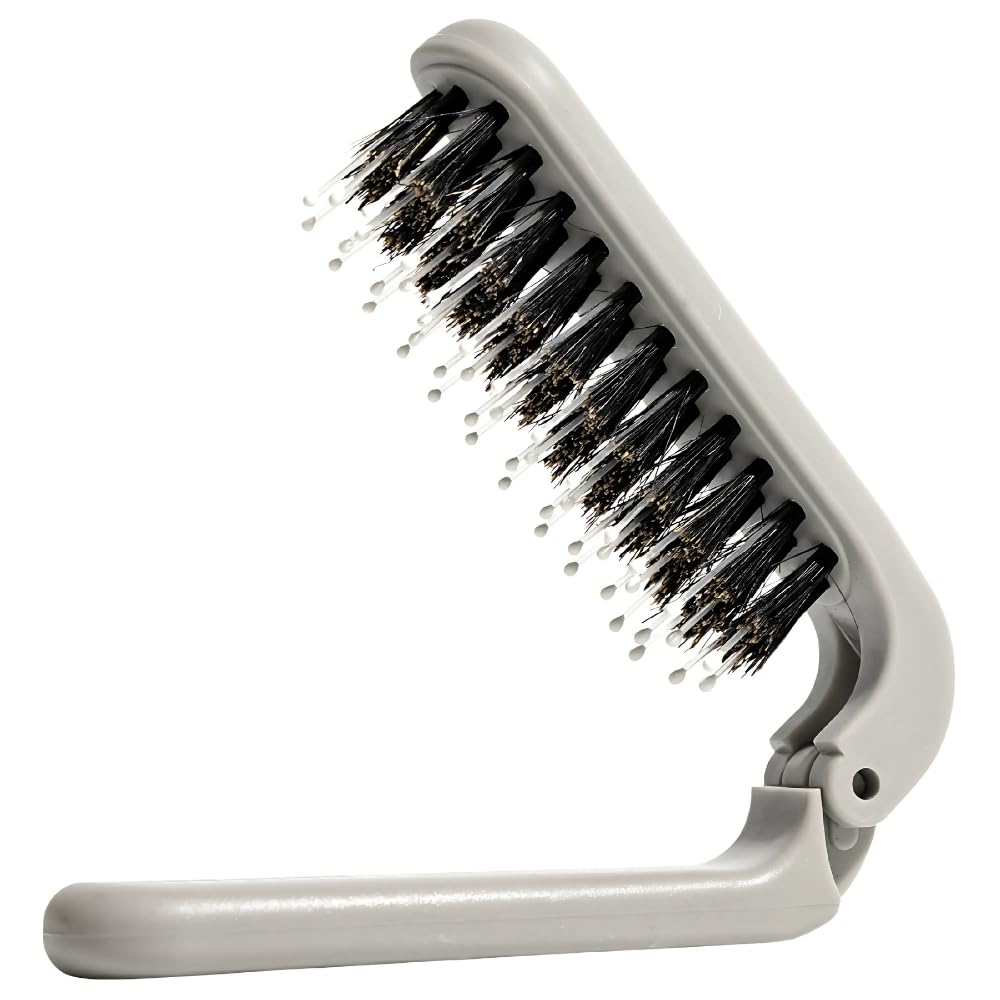 Uffy MiniPop folded travel brush in pocket for on-the-go touch-ups.