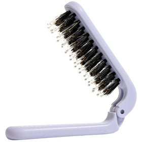 Uffy MiniPop travel brush folds flat with lavender handle for on-the-go detangling