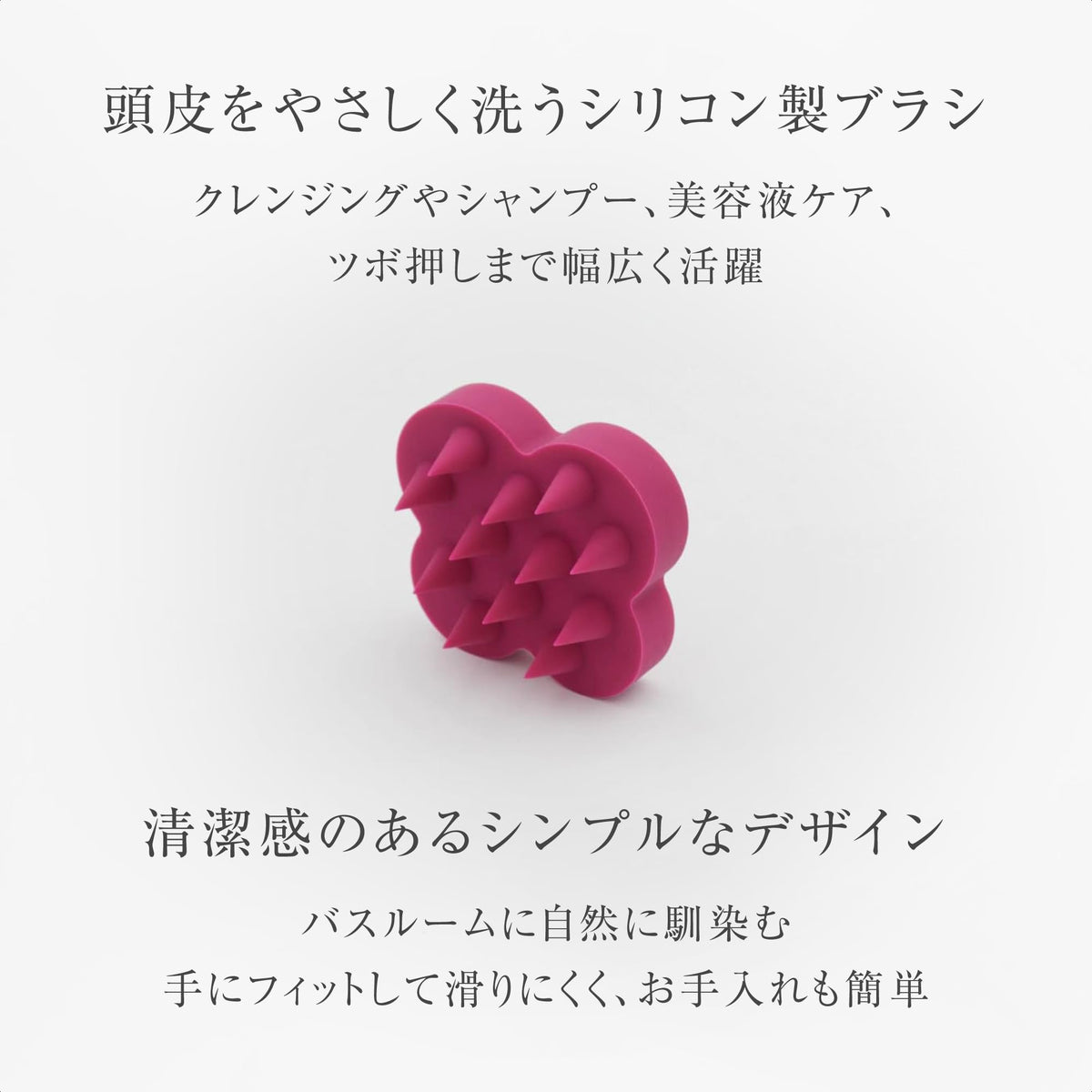 uka Shampoo Brush Kenzan in hand demonstrates compact size for travel