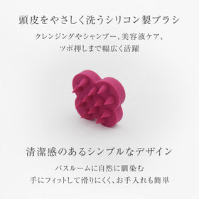 uka Shampoo Brush Kenzan in hand demonstrates compact size for travel
