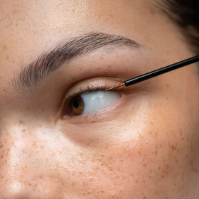 UKLASH apply serum on lash line closeup demonstrates simple daily use