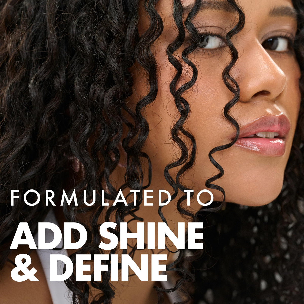 Umberto Giannini Curl Jelly on hair waves showcasing definition and curl hold.