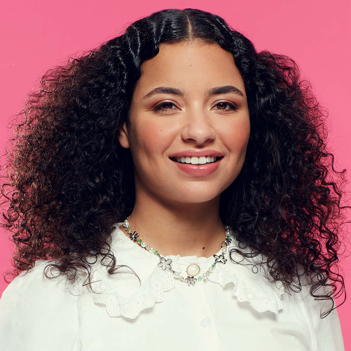 Umberto Giannini Curl Jelly in hand for scrunch-drying frizz control