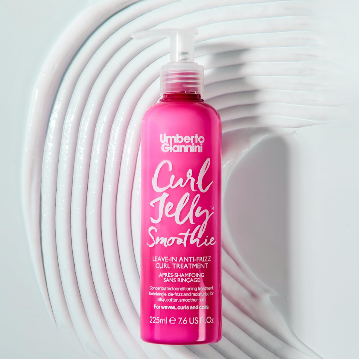 Umberto Giannini Curl Jelly Smoothie being applied on wet hair for detangling and styling.