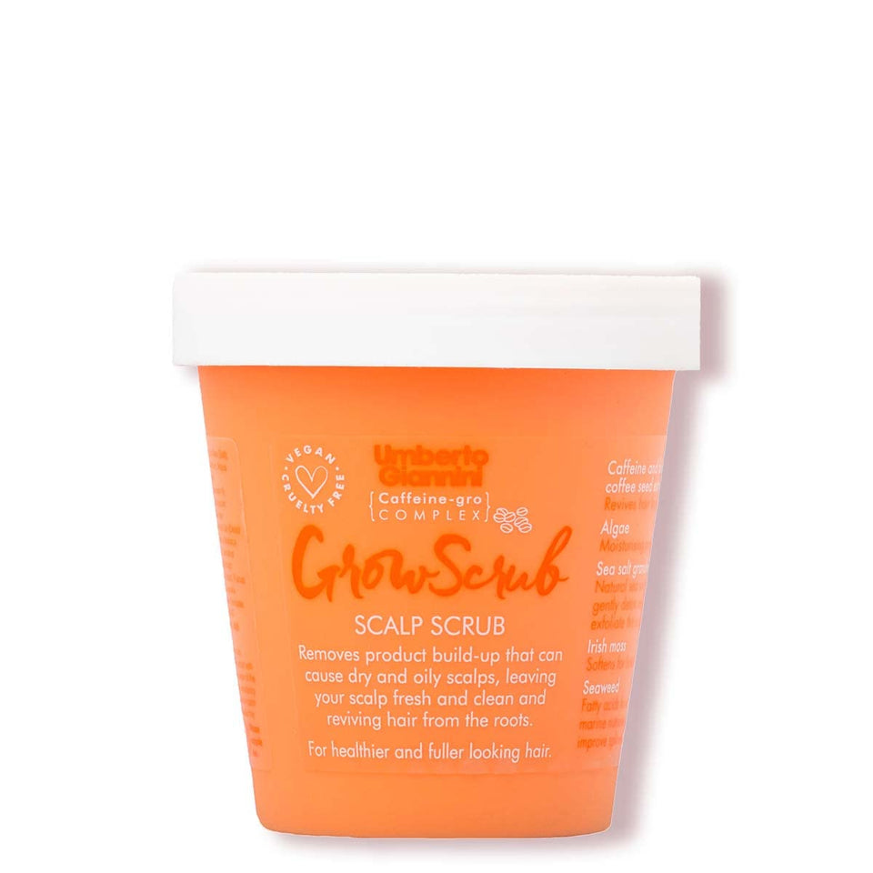 Umberto Giannini Grow Scrub bottle; scalp exfoliation for a refreshed base.