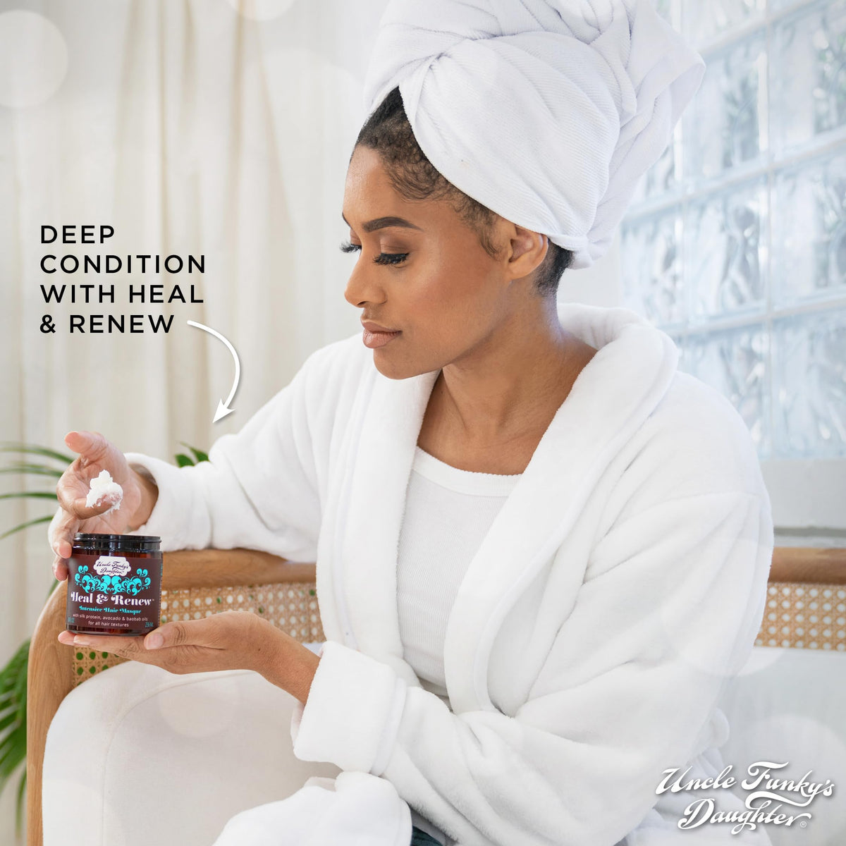 Uncle Funky's Daughter Heal and Renew application demonstrates easy scalp-friendly use.