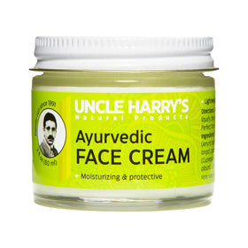 Uncle Harry's face cream with jojoba esters, close-up on hydrated skin.