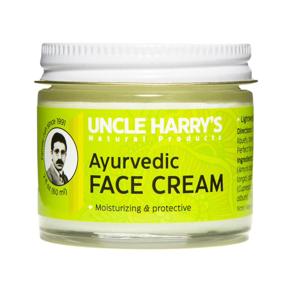 Uncle Harry's face cream with jojoba esters, close-up on hydrated skin.