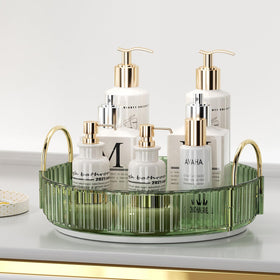 UNICOMVSX rotating makeup organizer on vanity for easy access to cosmetics.