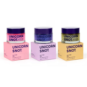 UNICORN SNOT flamingo glitter gel bottle adds bold glow to skin and cheeks for festival looks.