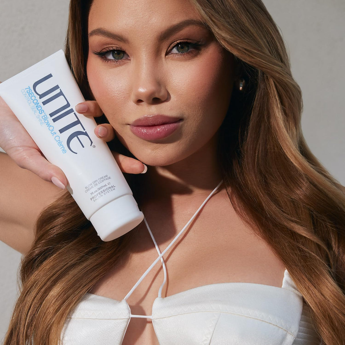 UNITE 7SECONDS BlowOut Crème offers UV and thermal protection during styling