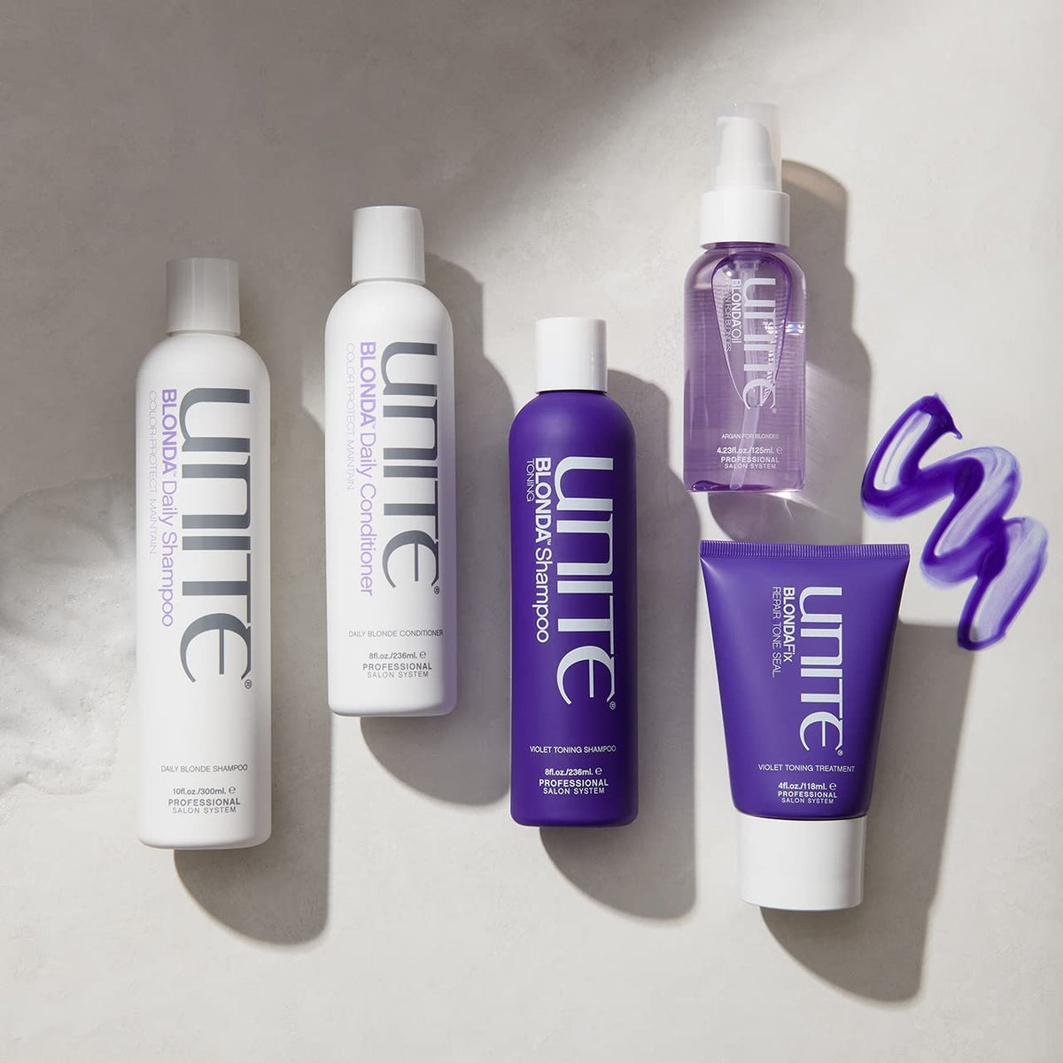 UNITE Blonda Daily Purple Conditioner extensions-safe formula on hair.