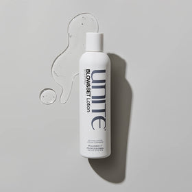 Model with beach waves enhanced by UNITE BLOW&SET lotion