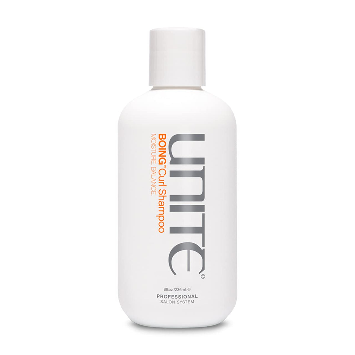 UNITE BOING Curl Shampoo pour demonstrates gentle cleansing that preserves natural oils in curls.