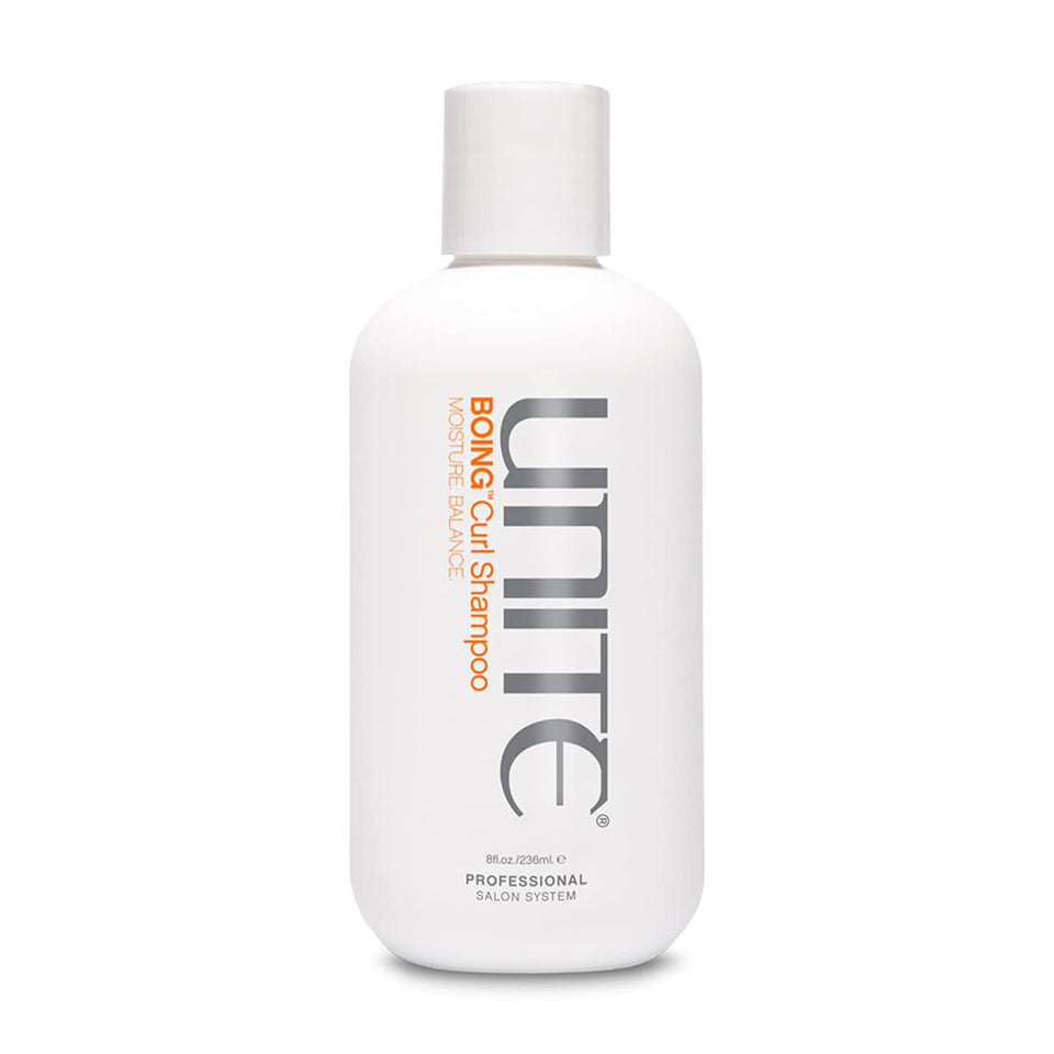 UNITE BOING Curl Shampoo pour demonstrates gentle cleansing that preserves natural oils in curls.