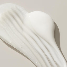 UNITE Hair U LUXURY Shampoo ingredients closeup featuring honey and pearl minerals