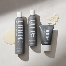 UNITE RE:UNITE conditioner packaging on display communicates premium repair formula