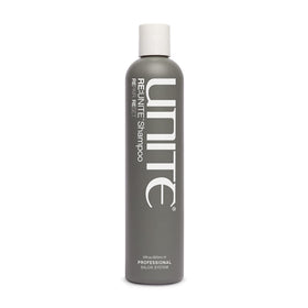 UNITE RE:UNITE Shampoo bottle on a vanity, ready to refresh dry hair.