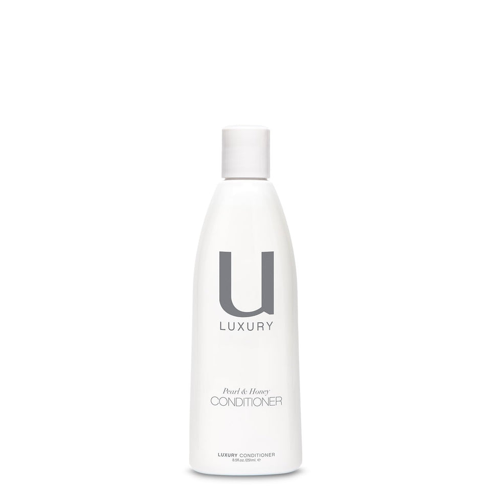 UNITE U LUXURY Conditioner bottle showcasing rich moisture for silky, protected hair