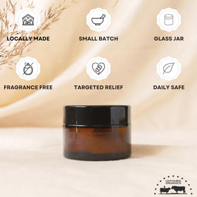 Untamed Organics balm applied to face for everyday moisture
