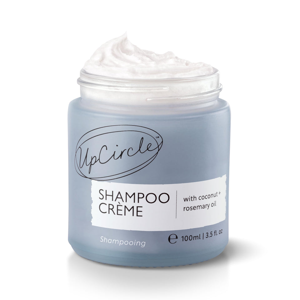 UPCIRCLE Shampoo Crème with Rosemary Oil and Pink Berry bottle for a gentle cleanse.