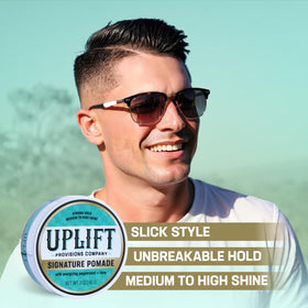 Uplift Provisions Signature Pomade applied for sleek, high shine look.