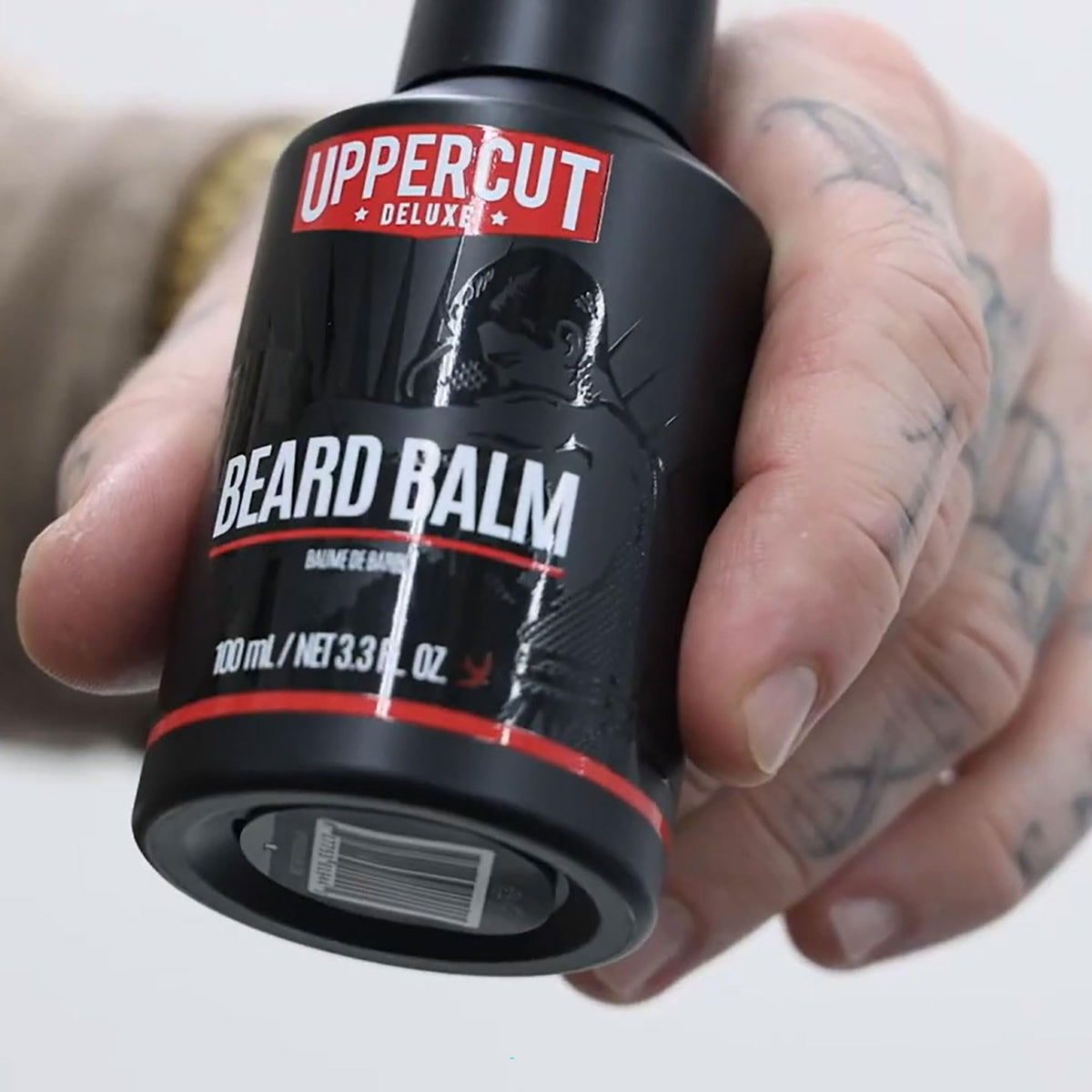Beard with natural shine from water-based Uppercut Deluxe balm, no heaviness.