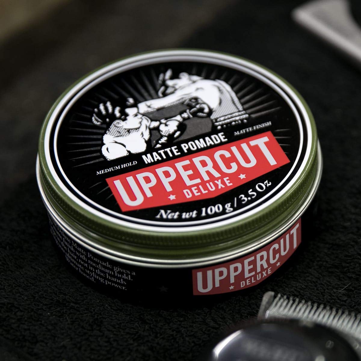 Uppercut Deluxe Matte Pomade application demonstrates smooth, even grip through hair.