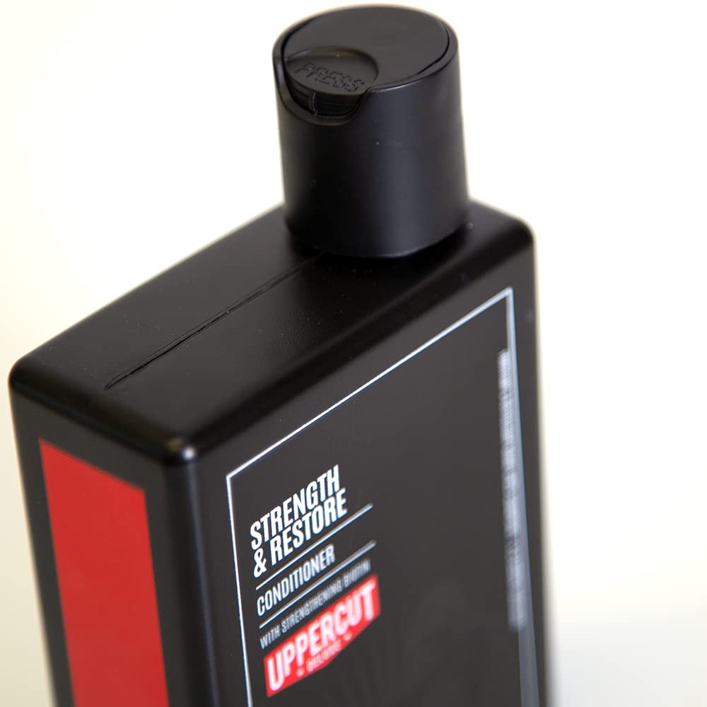 Uppercut Deluxe Strength & Restore conditioner bottle back showing ingredients