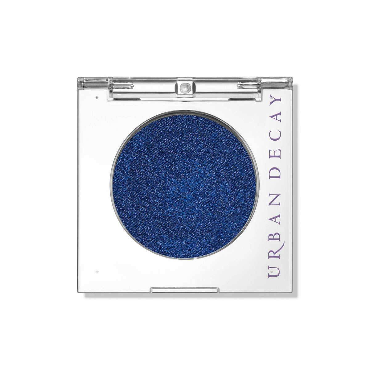 Urban Decay Charged compact swatch shows deep blue shimmer for bold evening wear.