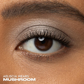 Urban Decay Mushroom swatch on skin shows gunmetal shimmer