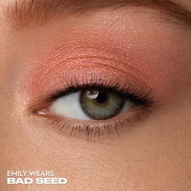 URBAN DECAY 24/7 Eyeshadow Single Bad Seed swatch shows rich pigment and smooth blend.