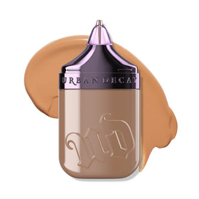 Urban Decay Face Bond foundation bottle close-up shows self-setting finish and sleek packaging.