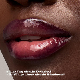 Urban Decay Lip Toy mauve shade swatch on lips.