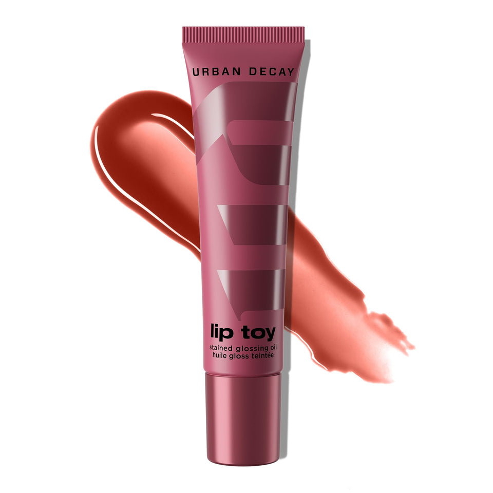 Urban Decay Lip Toy swatch showing acai drizzle lip stain with shine.