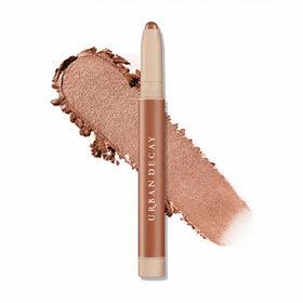 Urban Decay Naked Eyeshadow Stick Toasty copper bronze shimmer swatch for crease-proof lids.