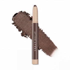 Urban Decay Naked Eyeshadow Stick showing twist-up application for quick color payoff