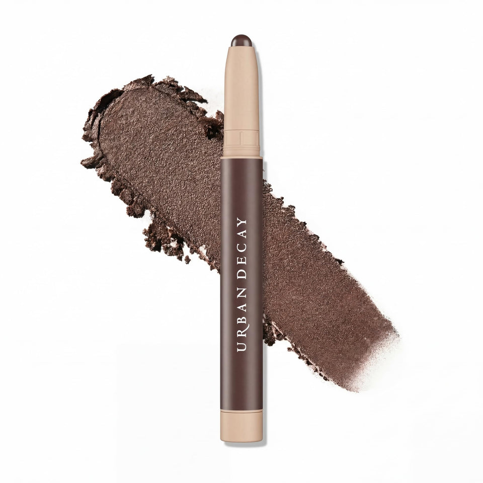 Urban Decay Naked Eyeshadow Stick showing twist-up application for quick color payoff