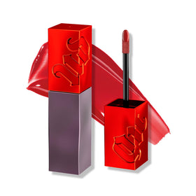 Urban Decay Vice Lip Bond Unbreakable swatch showing long-lasting color with a brilliant shine.