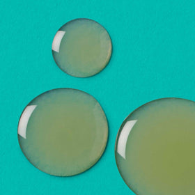 Urban Skin Rx Even Tone Serum texture shown as dewy, lightweight finish.