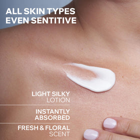 Applying Uriage lotion to dry skin for soothing hydration.