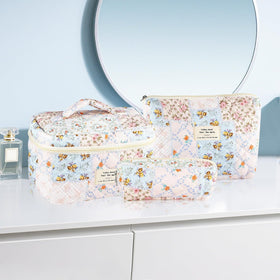 URSKYTOUS soft cotton quilted makeup bag adds lightweight storage.