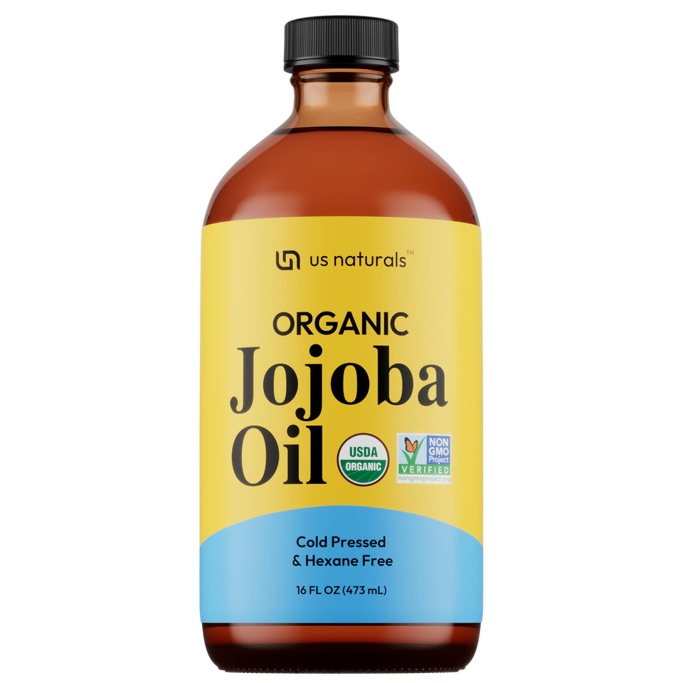 Us Naturals jojoba oil bottle closeup highlighting the pure formula for skin care.