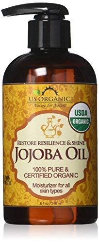 US Organic Jojoba Oil on hair — supports moisture and frizz control.