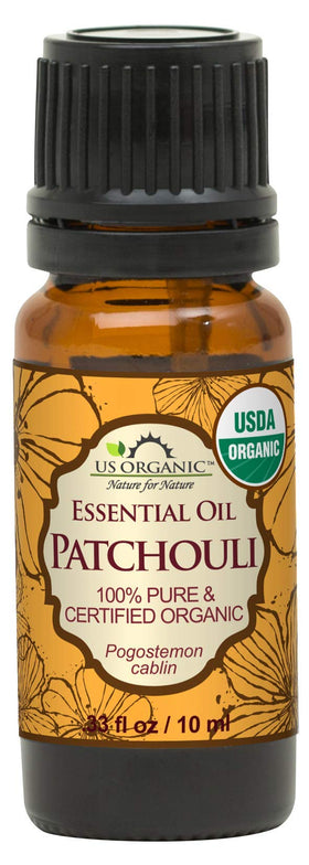 US Organic Patchouli Oil bottle showcases pure, organic fragrance for perfumery and skincare prep.