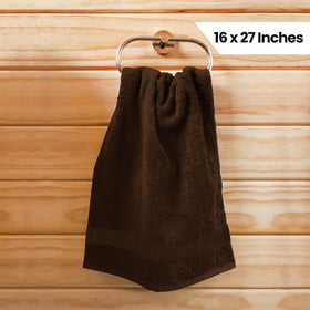 Utopia Towels dark brown towels stack, concealing wear between washes.