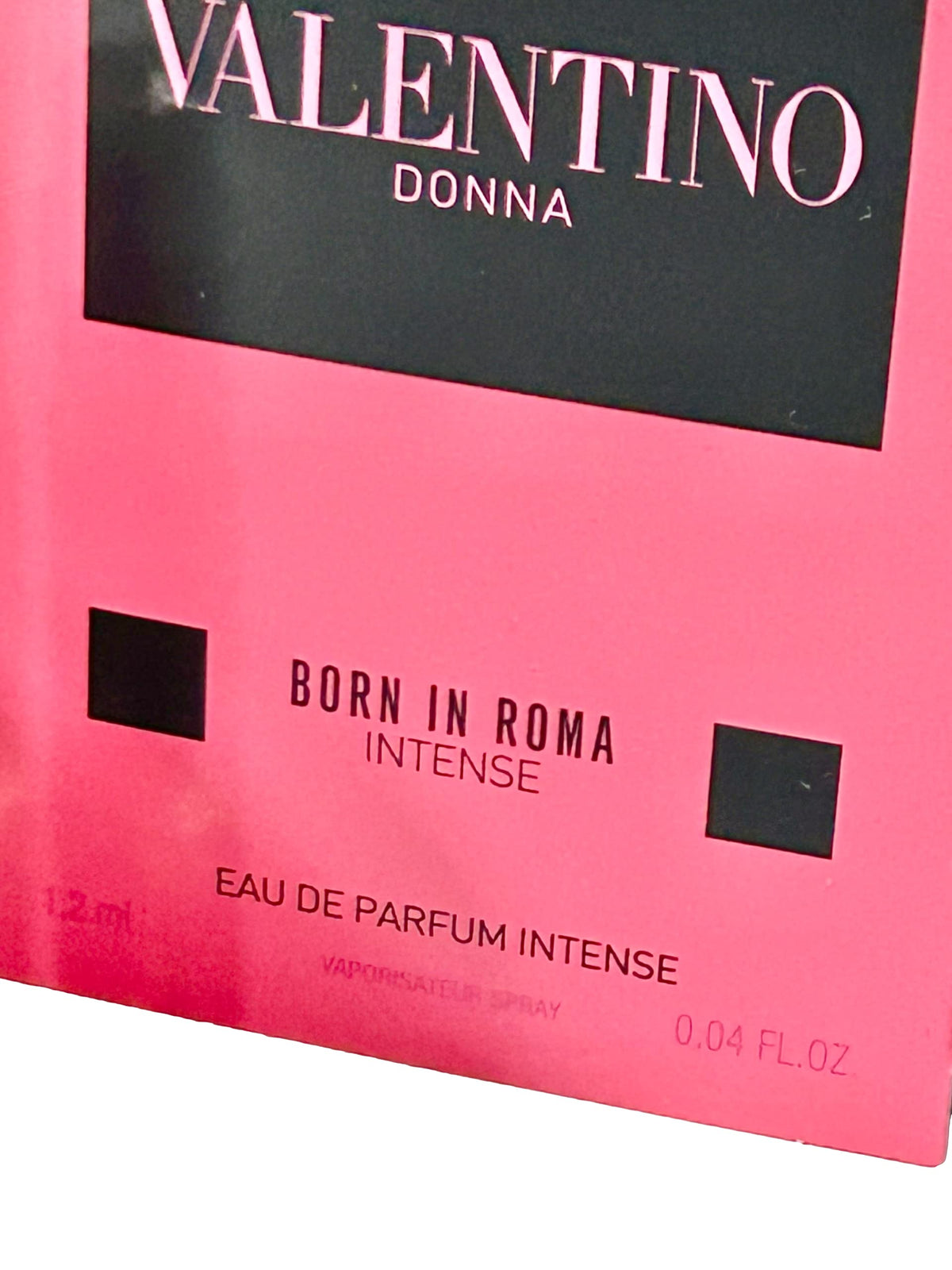 Valentino Born in Roma Intense EDP mini vial closeup, elegant design and on-the-go use
