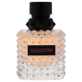 Valentino Donna Born in Roma Coral Fantasy bottle closeup cap, hints of luxury and lasting impression.
