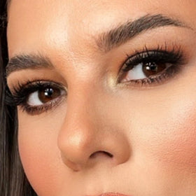 Swatch of VASANTI Kajal Waterline Eyeliner Hazel Brown on skin reveals rich, blendable shade