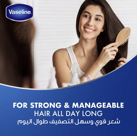 Vaseline Hair Tonic application on scalp for gentle massage.